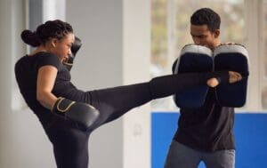 Instructor teaching cardio kickboxing techniques in Randolph New Jersey