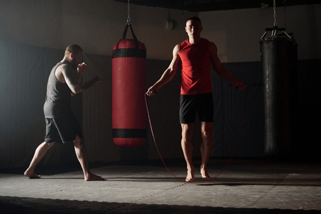 Instructor leading cardio kickboxing class at Morris County Wrestling & Martial Arts helping students burn fat and lose weight