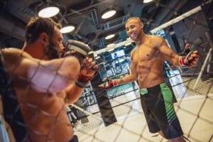 MMA coach in Morris County helping a beginner gain confidence and get fit through training